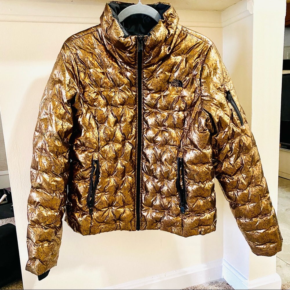 The North Face down puffer jacket. L